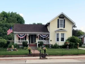 A photo of a yellow house